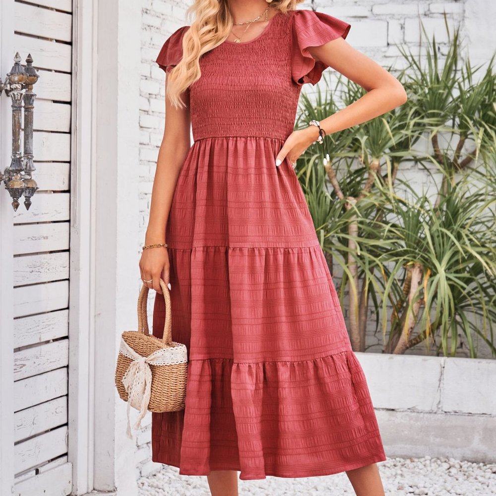 Solid color flying sleeved layering large swing dress